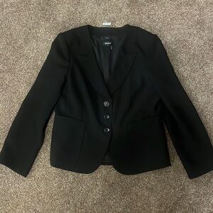 DKNY blazer. Fits like a large, but doesn’t have size tag